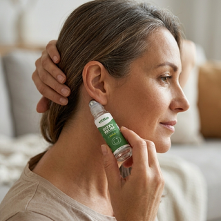 Applying VertigoEase behind the ear